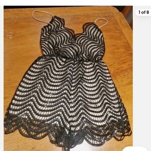 Charlotte Russe Black and Cream Striped Romper